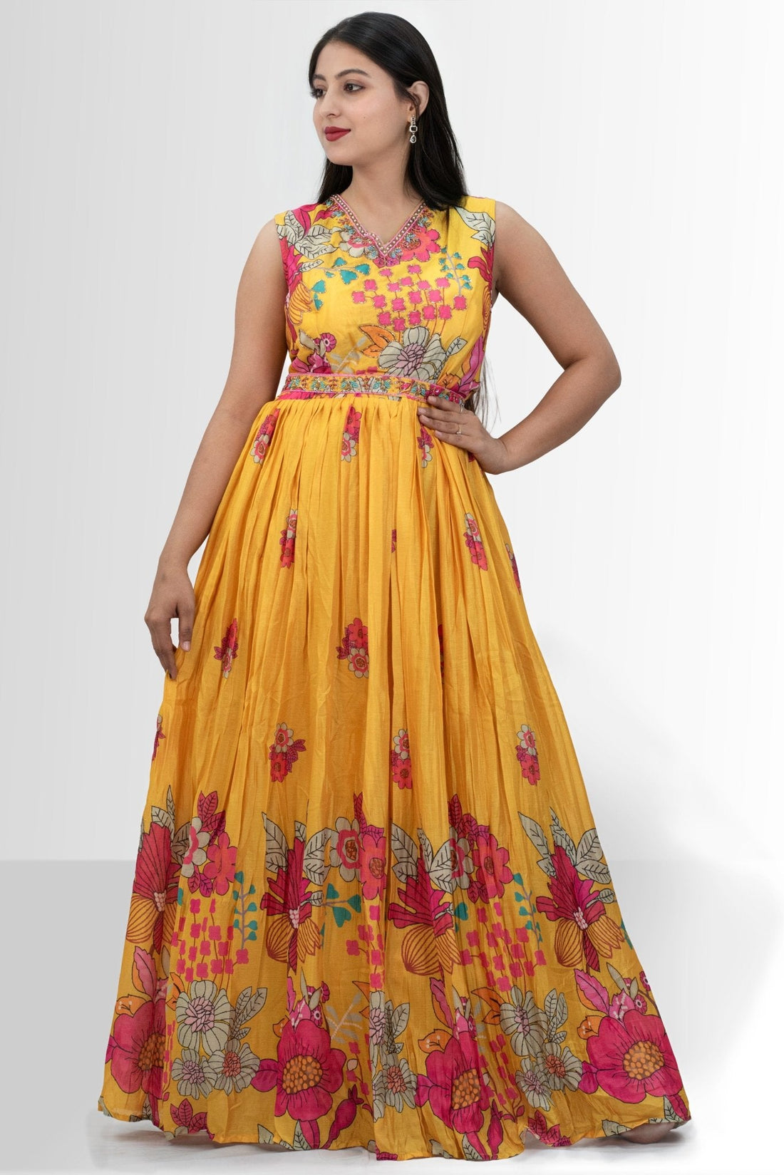 Vibrant yellow floral print gown with embellished neckline — featured in Rosio House blog post: What to Wear to a Beach Holiday or Pool Party: Your Style Guide