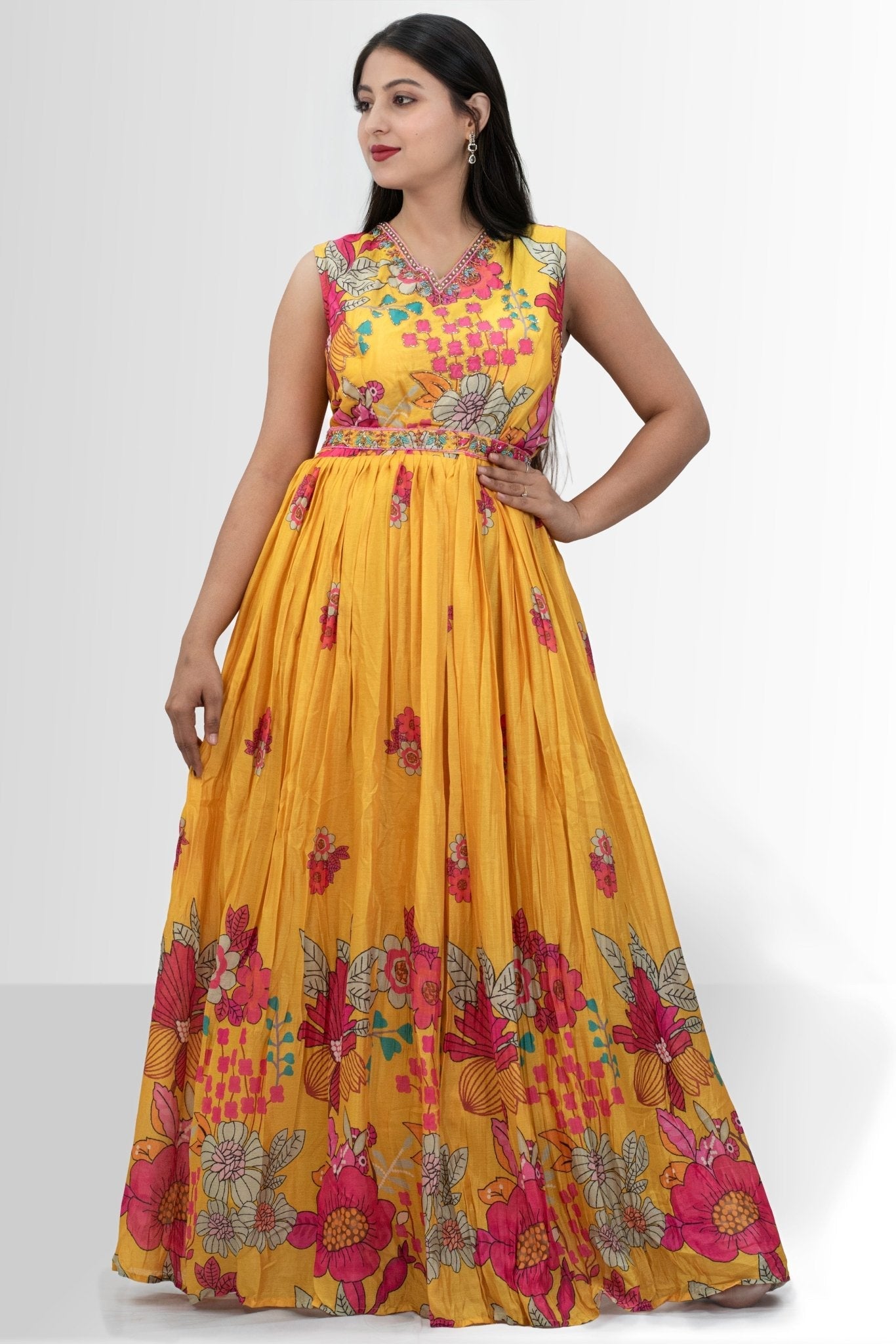 Vibrant yellow floral print gown with embellished neckline — featured in Rosio House blog post: What to Wear to a Beach Holiday or Pool Party: Your Style Guide