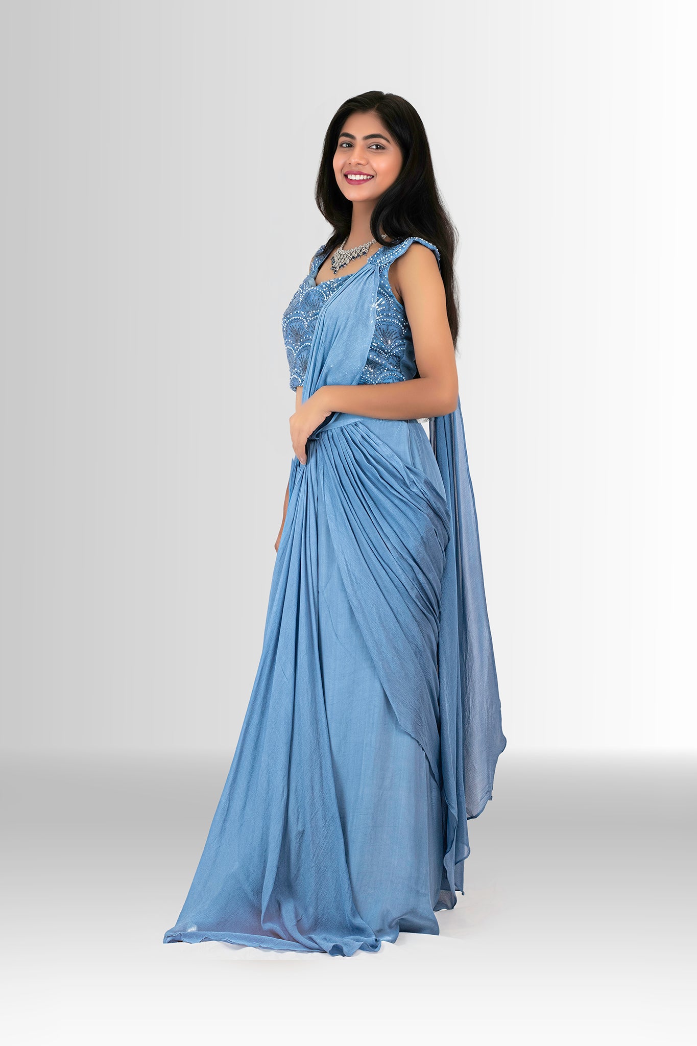 Woman in a blue drape saree indowestern 2