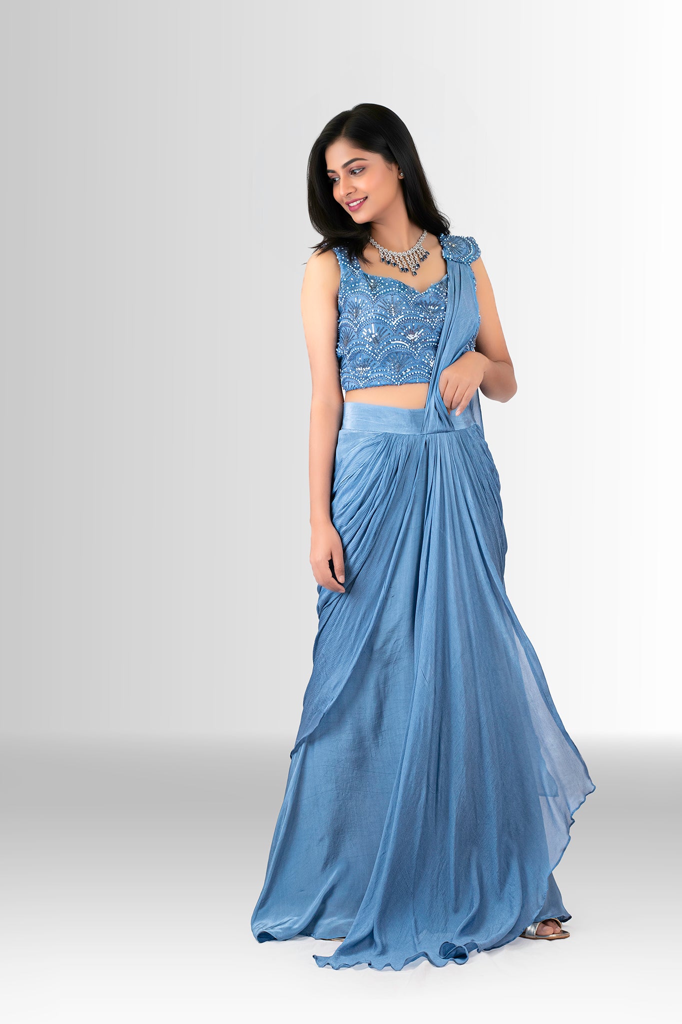 Woman in a blue drape saree indowestern 3