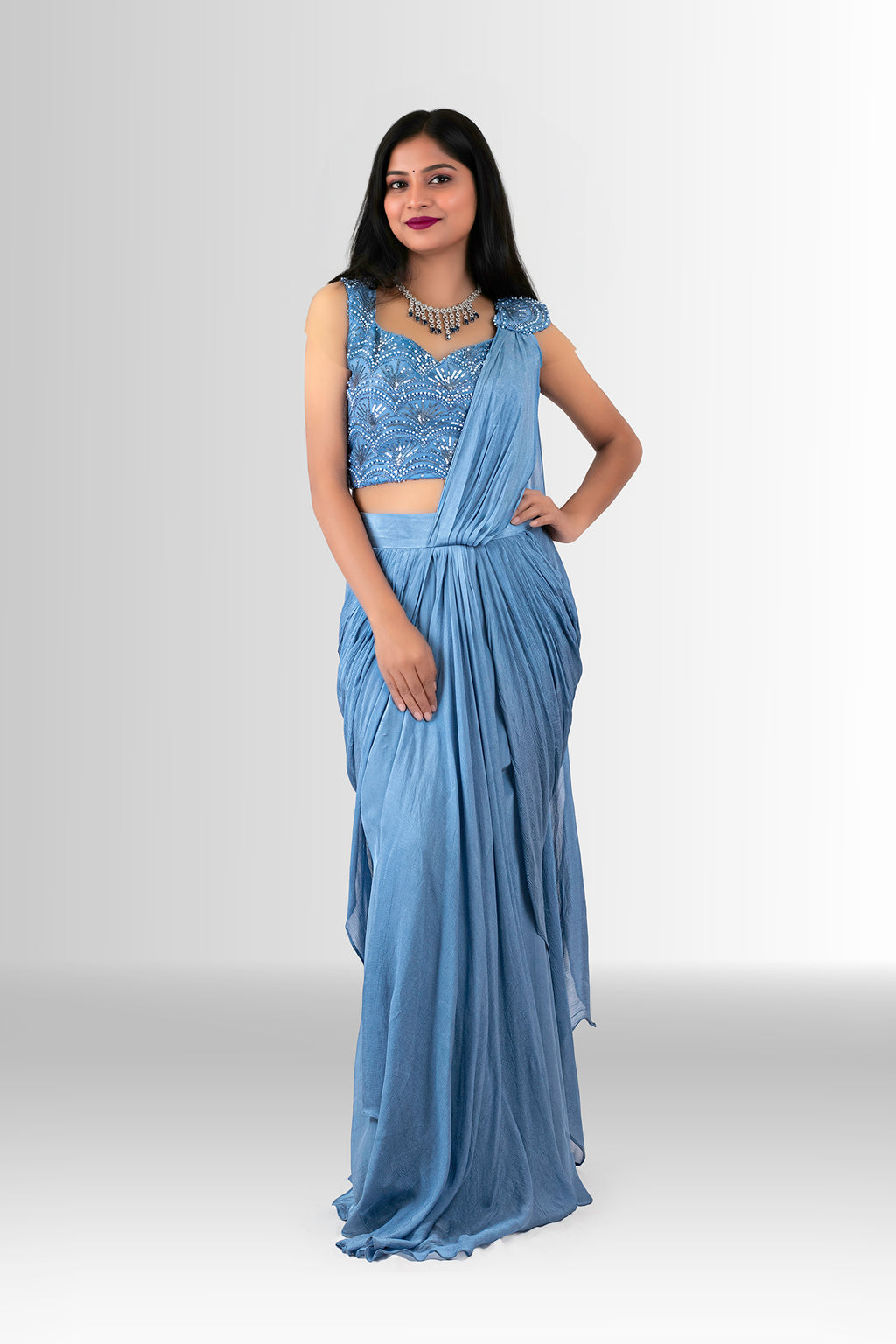 Woman in a blue drape saree indowestern 5
