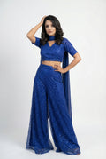 Full body front view of the Rosio House electric blue sharara set featuring full sequin work on the crop top and flared pants.
