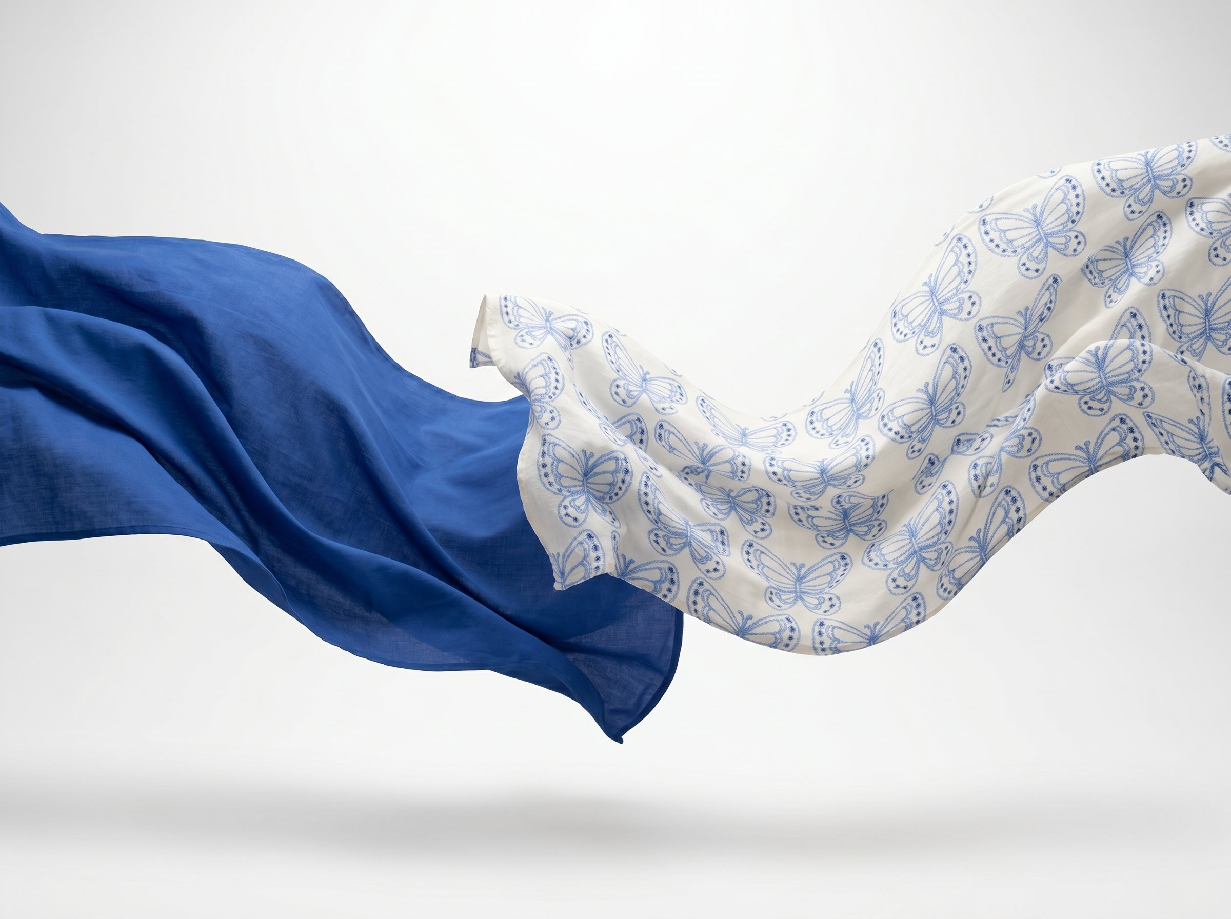 Two cotton fabrics flying photoshoot