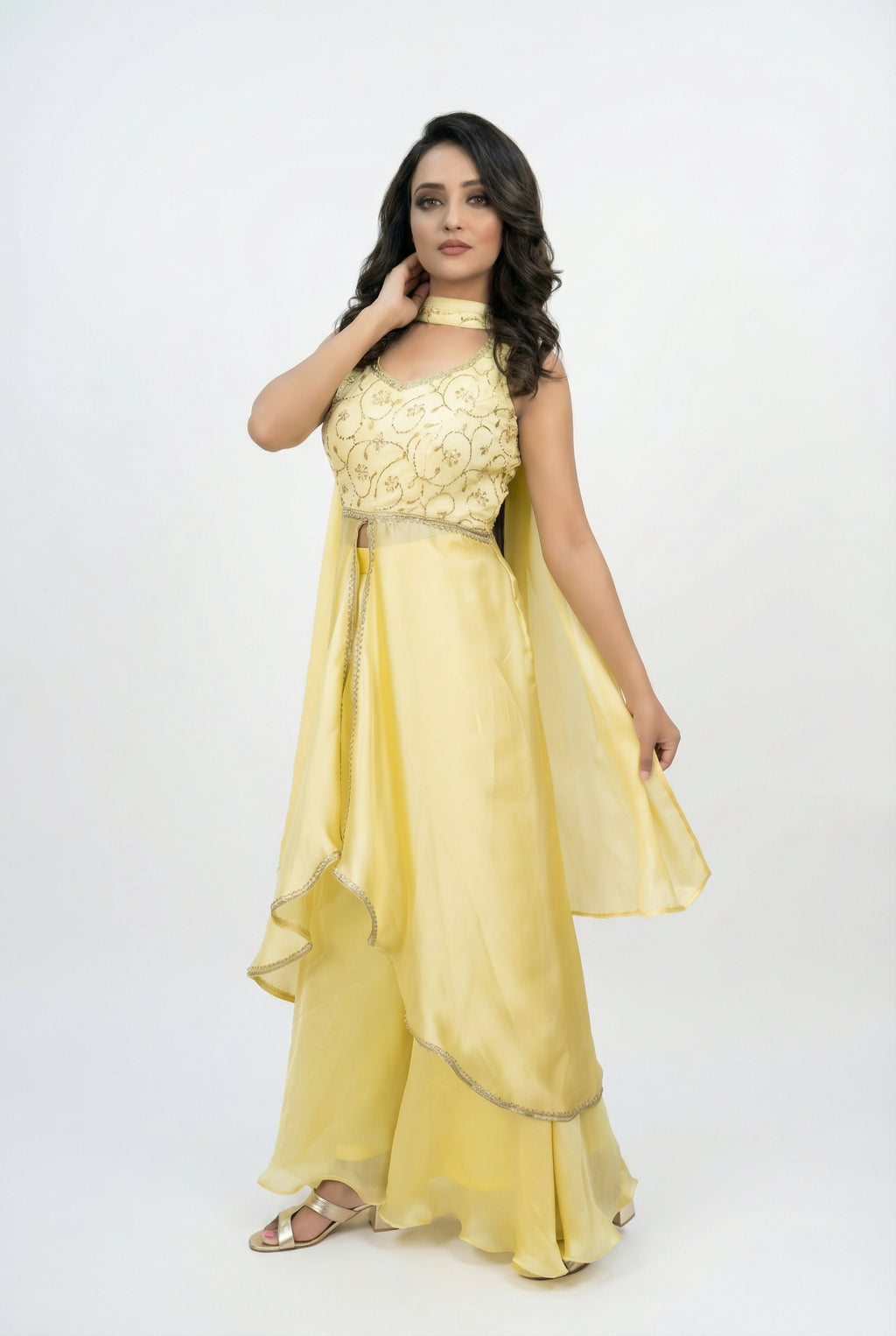 Close-up of the matching yellow fabric choker accessory worn on the neck, replacing the traditional dupatta.