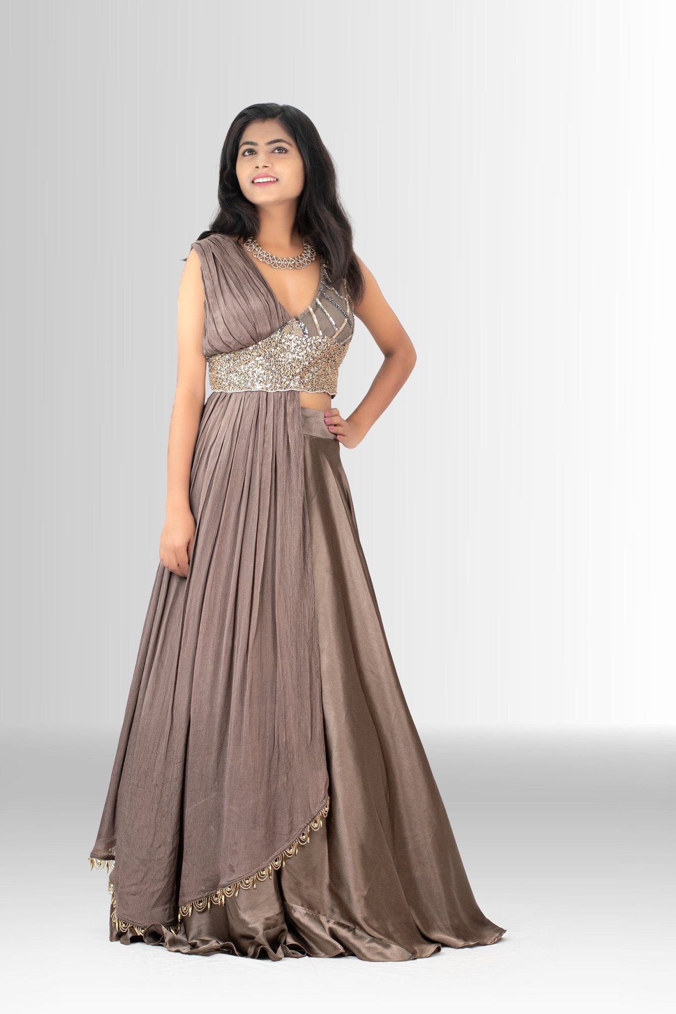 Elegant Indo-Western gown with draped design and hand-embroidered blouse