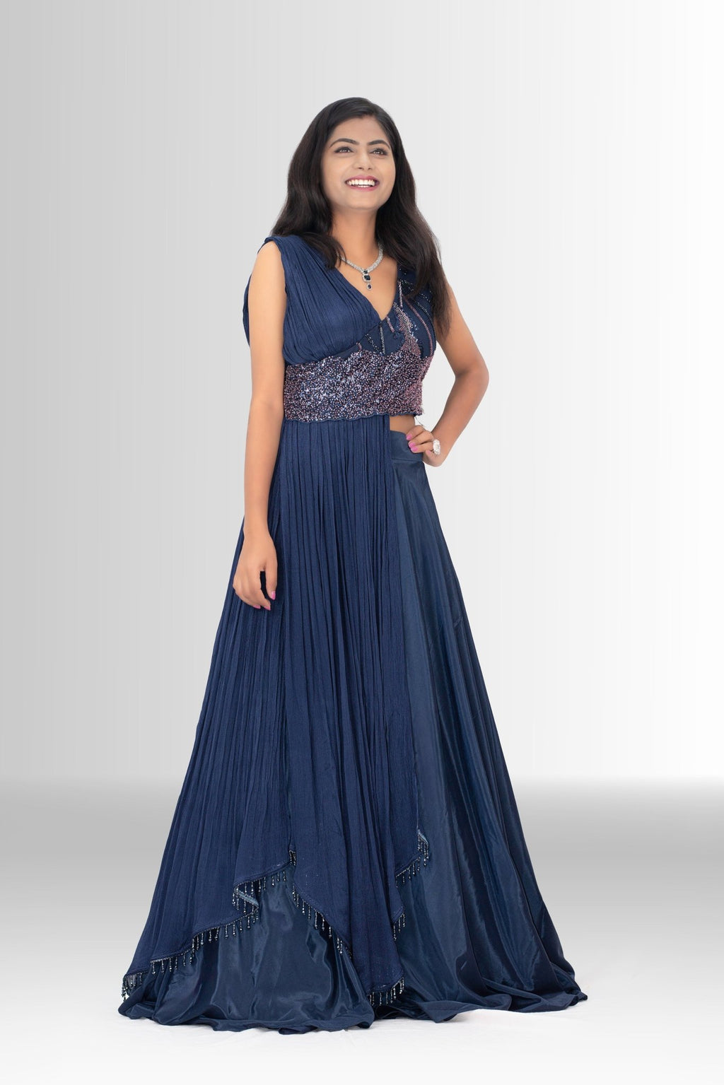 Indo-Western designer gown with hand embroidery and draped details