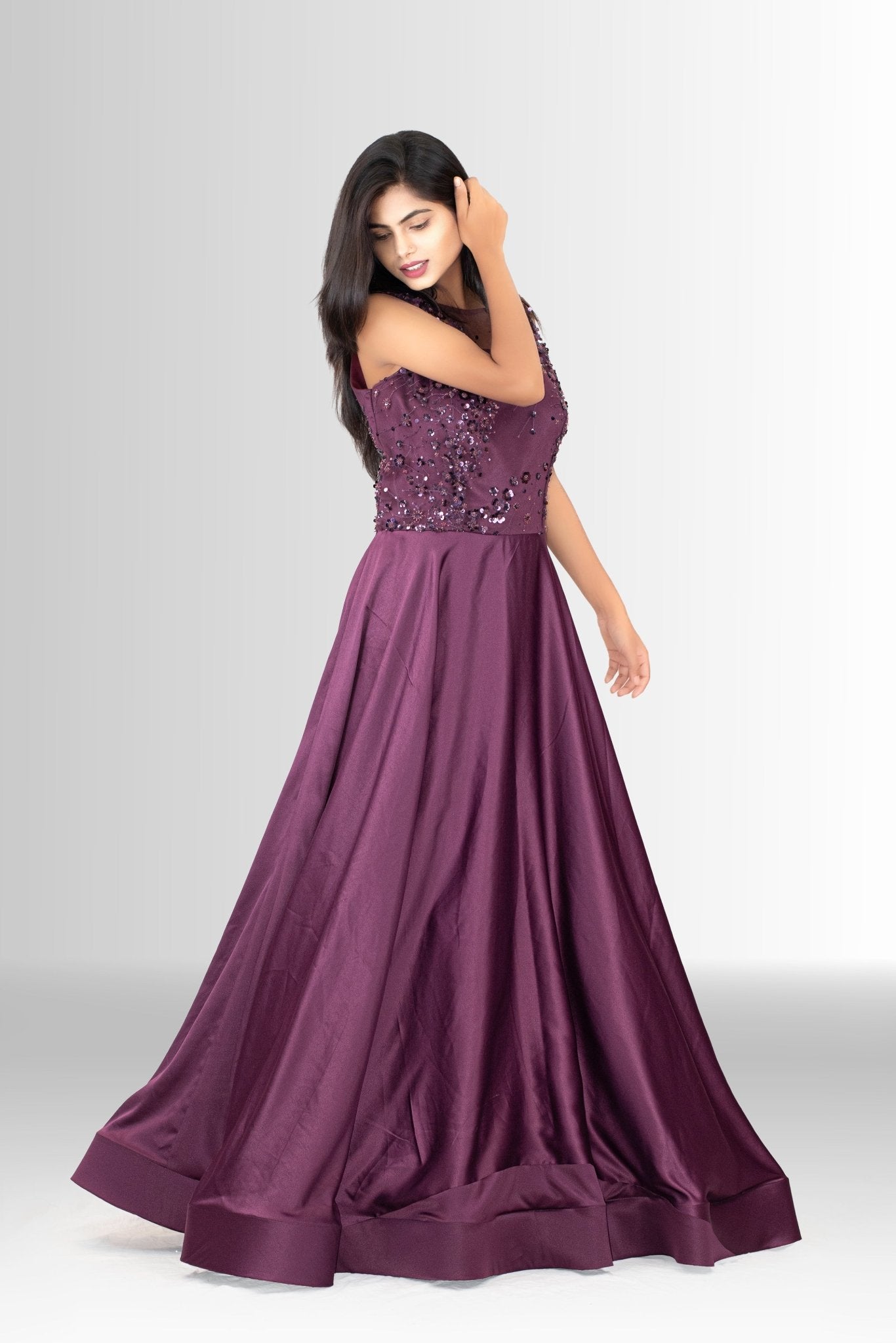 Rosio House A-line evening gown for women in a beautiful plum shade, perfect for weddings and formal parties, with a detailed sequin top.