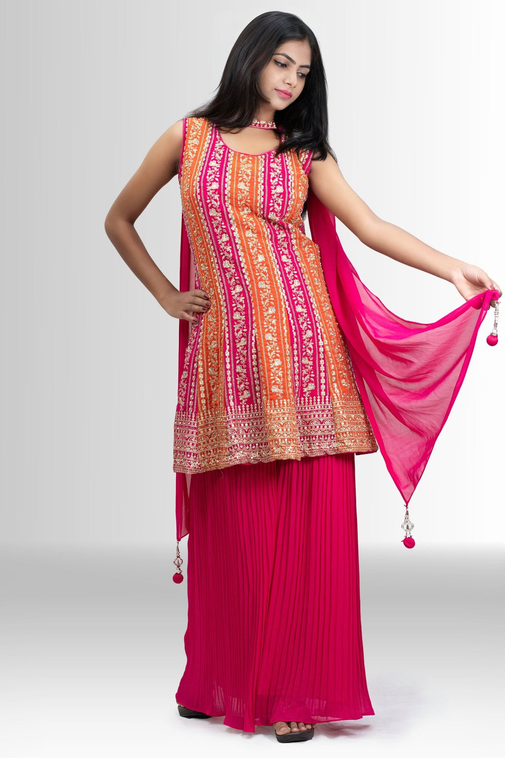 Embroidered Peplum Sharara outfit in Rani Pink & Orange