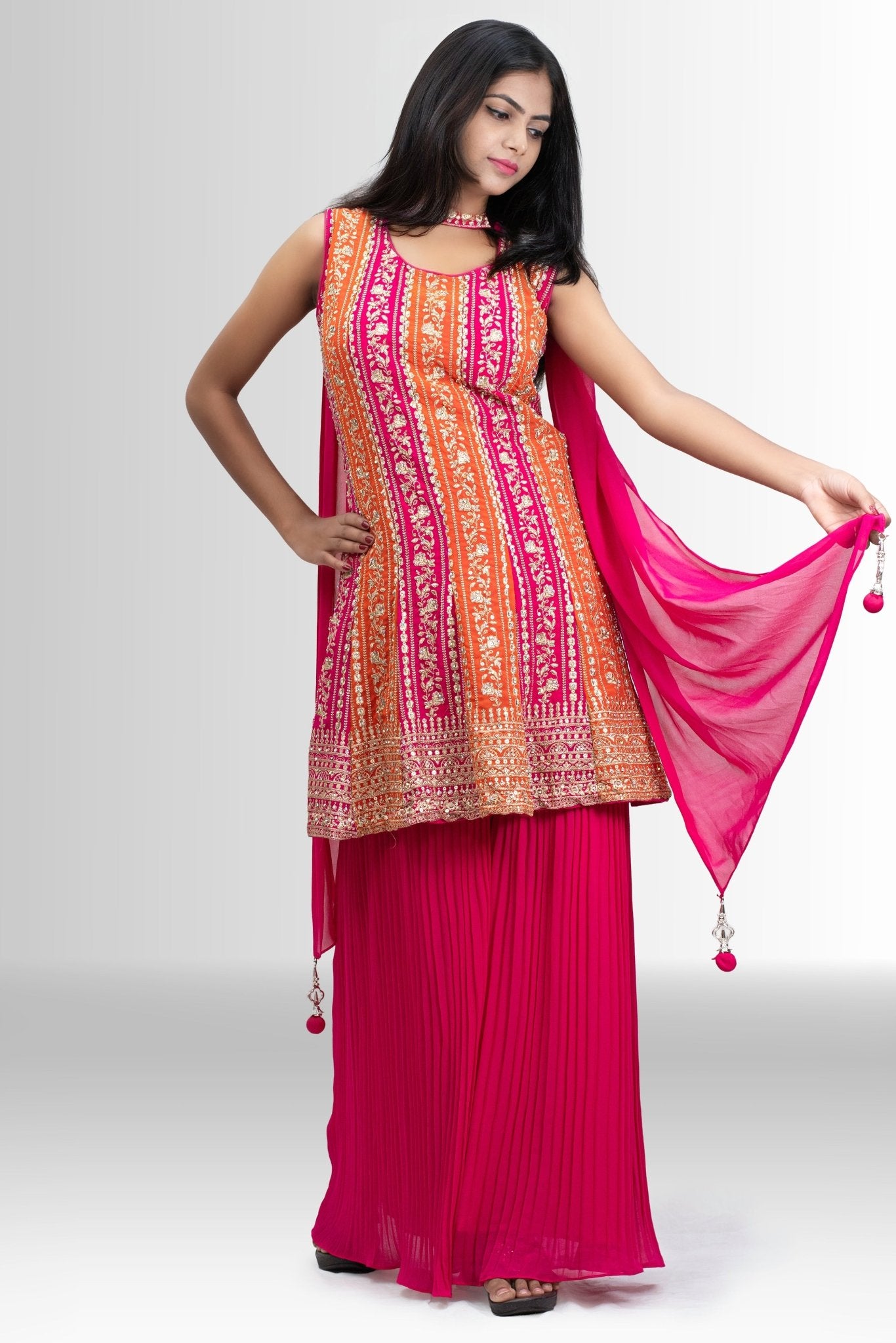 Embroidered Peplum Sharara outfit in Rani Pink & Orange