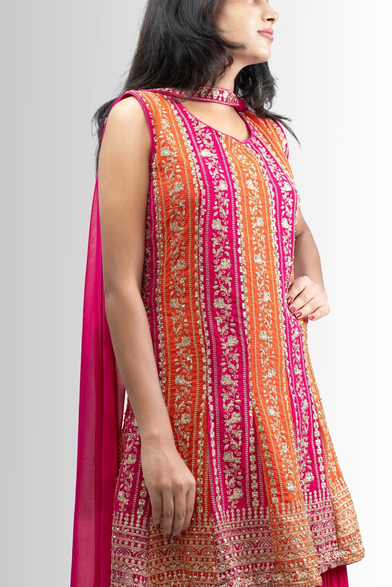 Embroidered Peplum Sharara outfit in Rani Pink & Orange