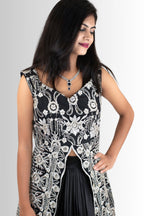 Close-up of white embroidery on black Indo-Western jacket Rosio House