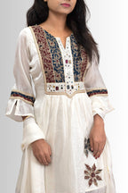 Stylish Ivory Whisper tunic featuring delicate embroidered patterns