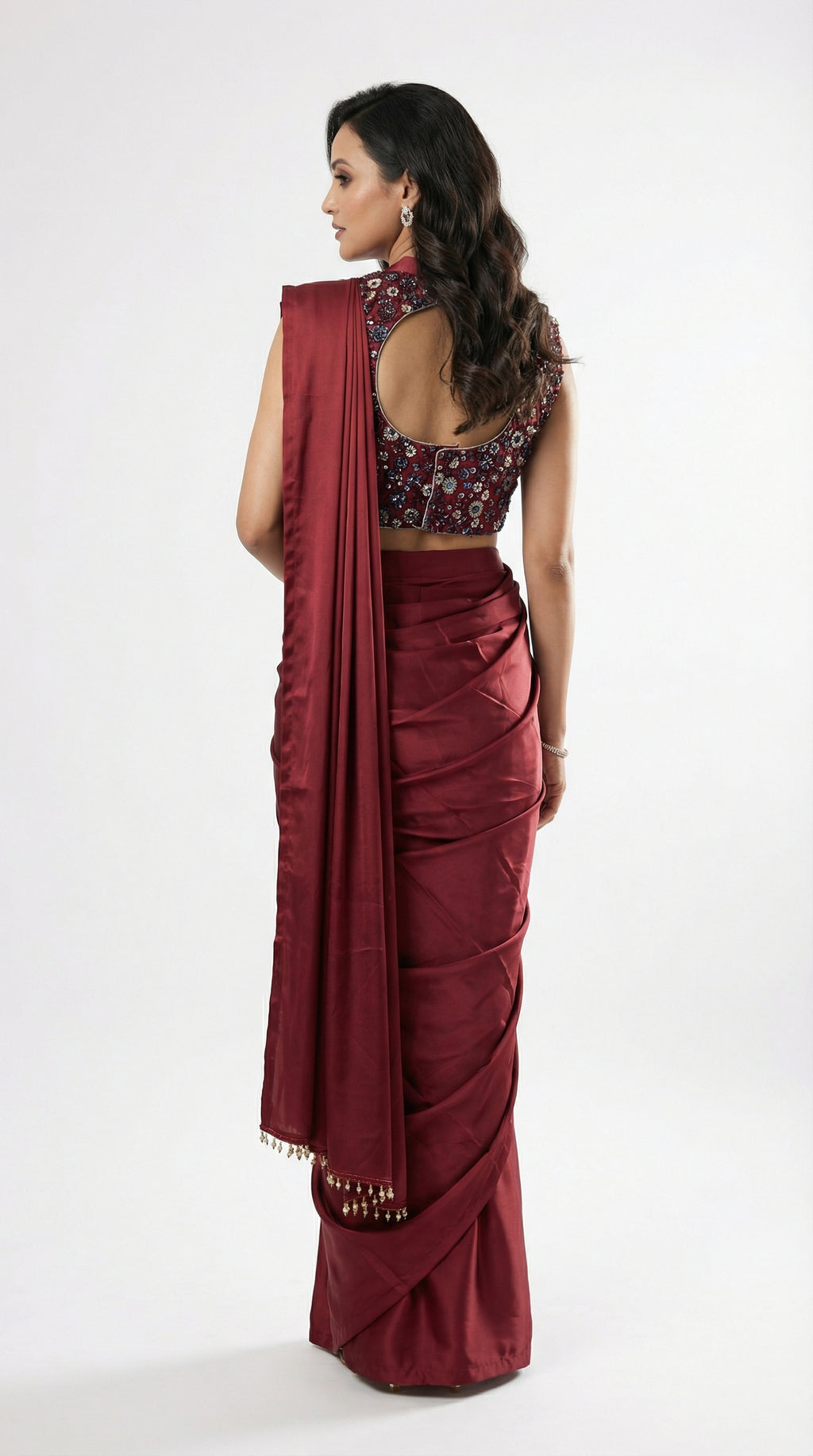 Full body front view of the Rosio House maroon satin drape saree set featuring a high-neck floral blouse.