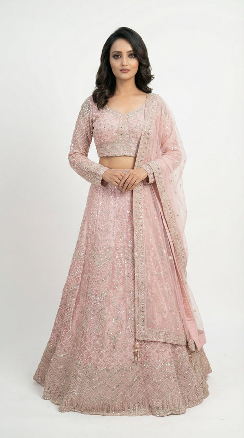 Woman wearing a pink traditional outfit with a white background