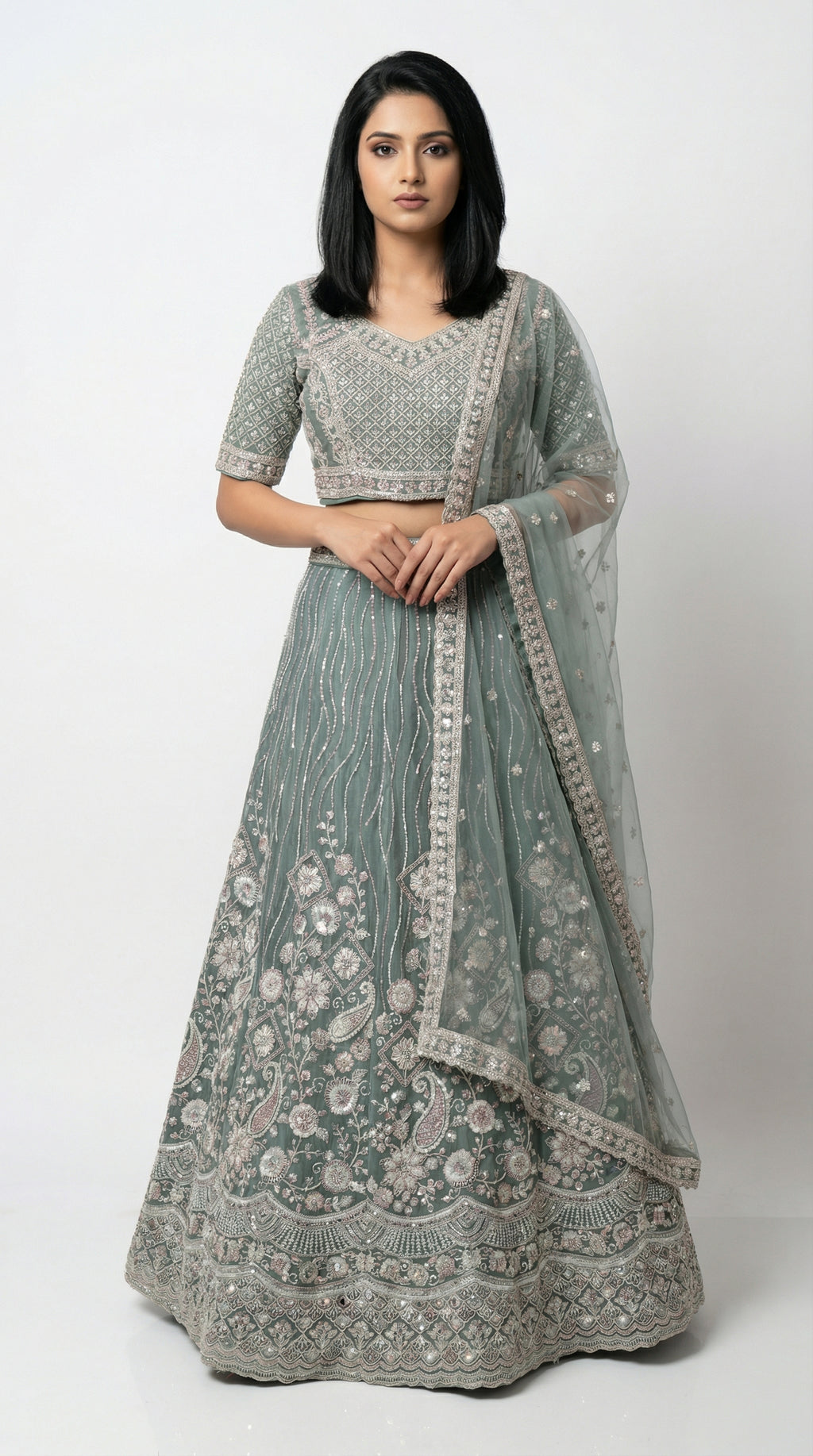 Women wearing green handwork lehenga with hand embroidery for wedding and sider lehenga