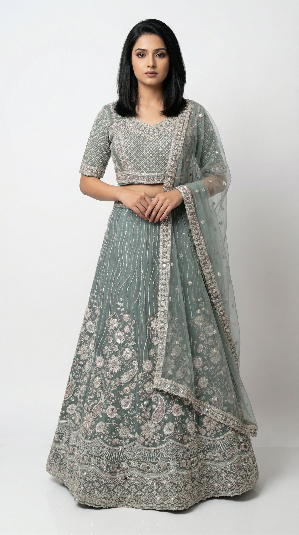 Women wearing green handwork lehenga with hand embroidery for wedding and sider lehenga