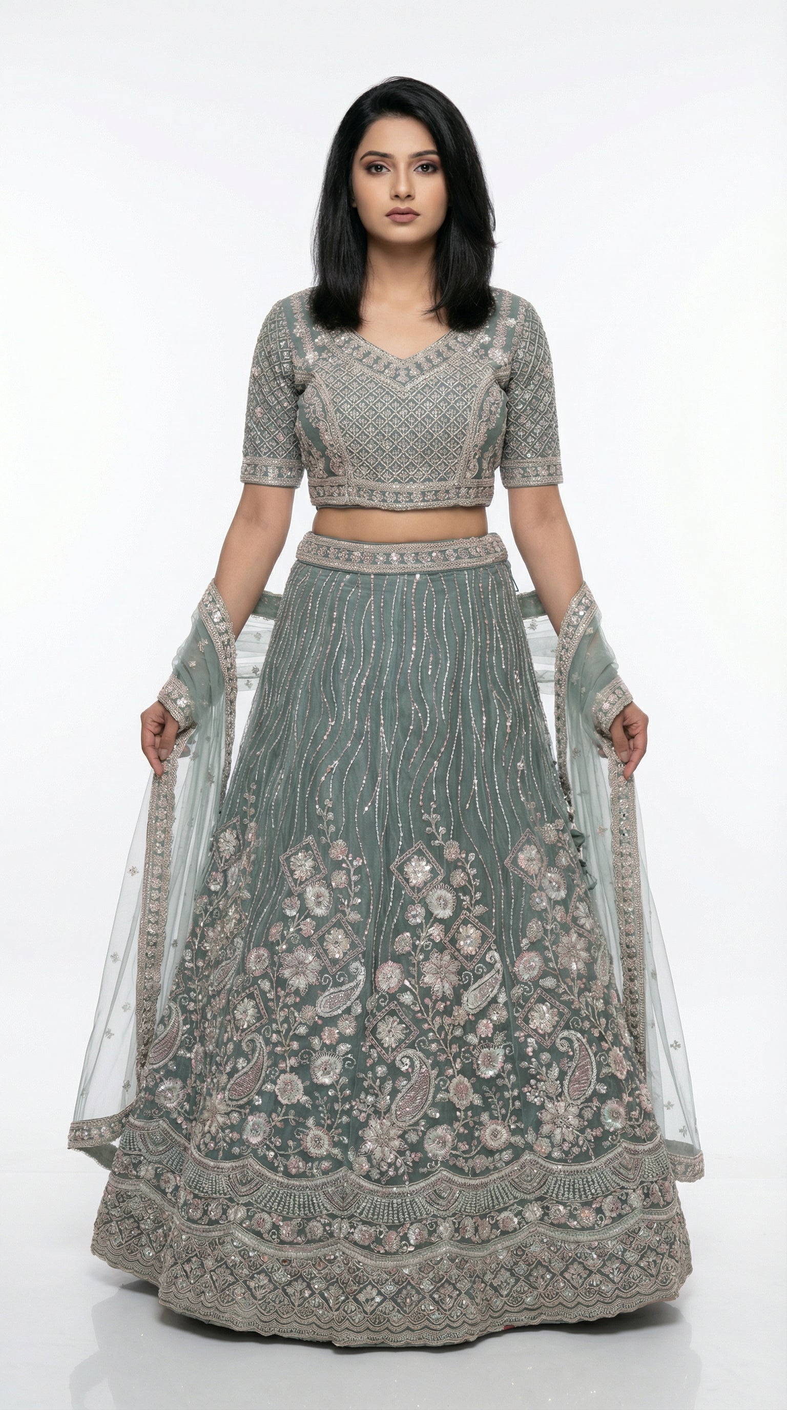Women wearing green handwork lehenga with hand embroidery for wedding and sider lehenga