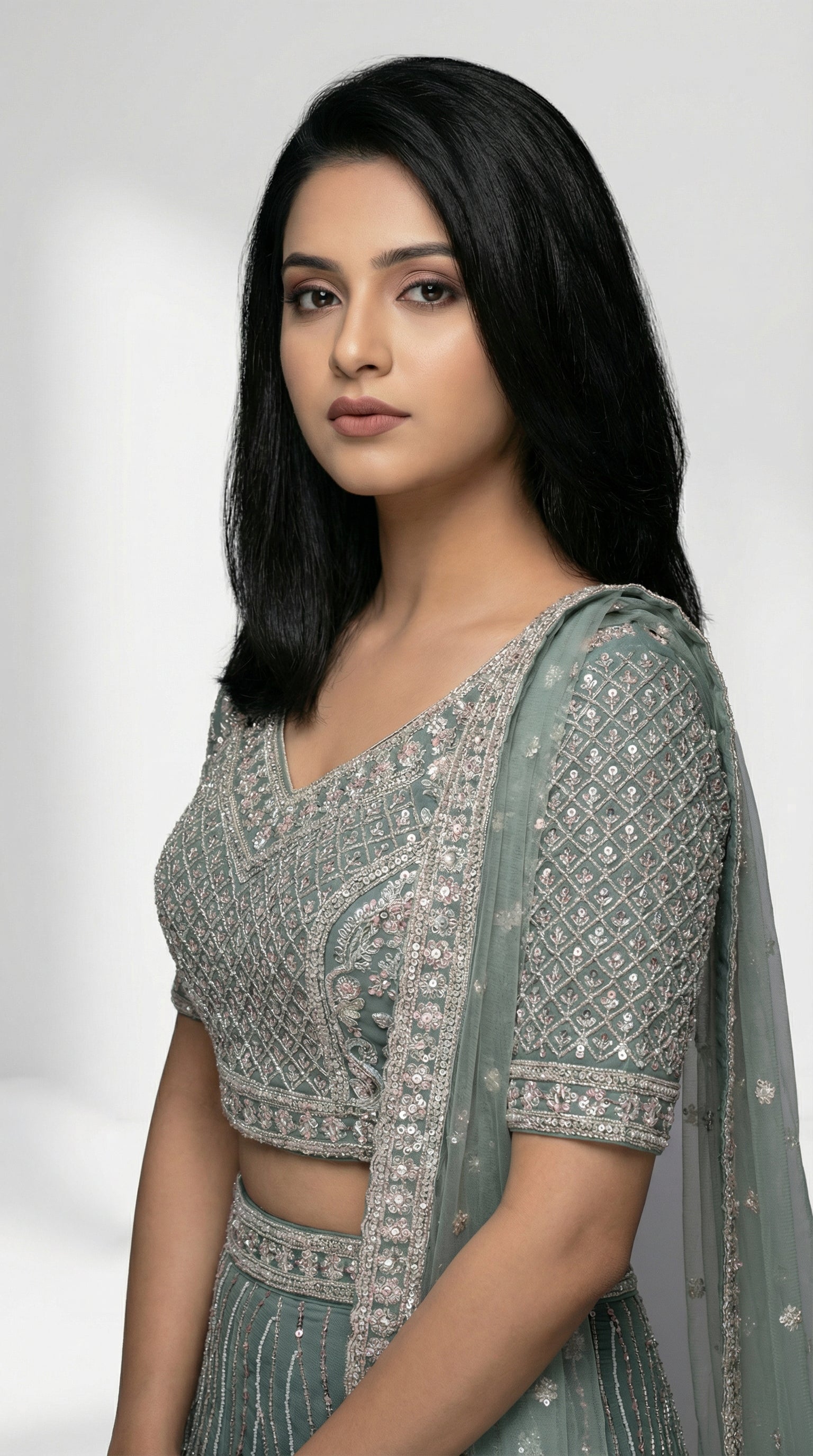 Women wearing green handwork lehenga with hand embroidery for wedding and sider lehenga