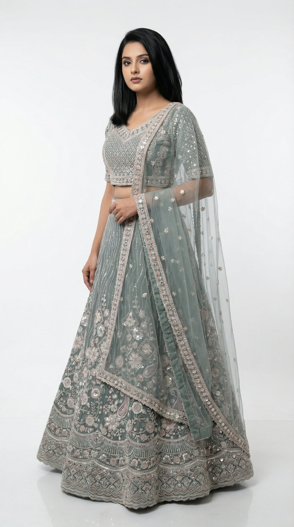 Women wearing green handwork lehenga with hand embroidery for wedding and sider lehenga