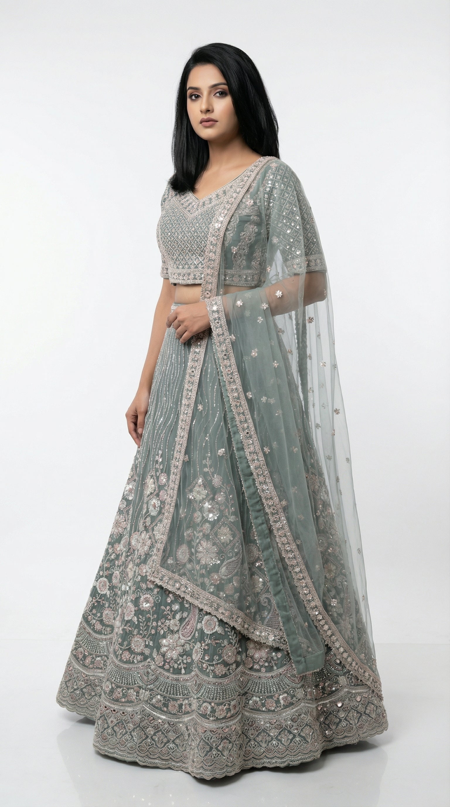 Women wearing green handwork lehenga with hand embroidery for wedding and sider lehenga