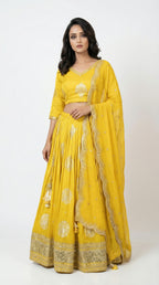 Women wearing banasri yellow lehenga