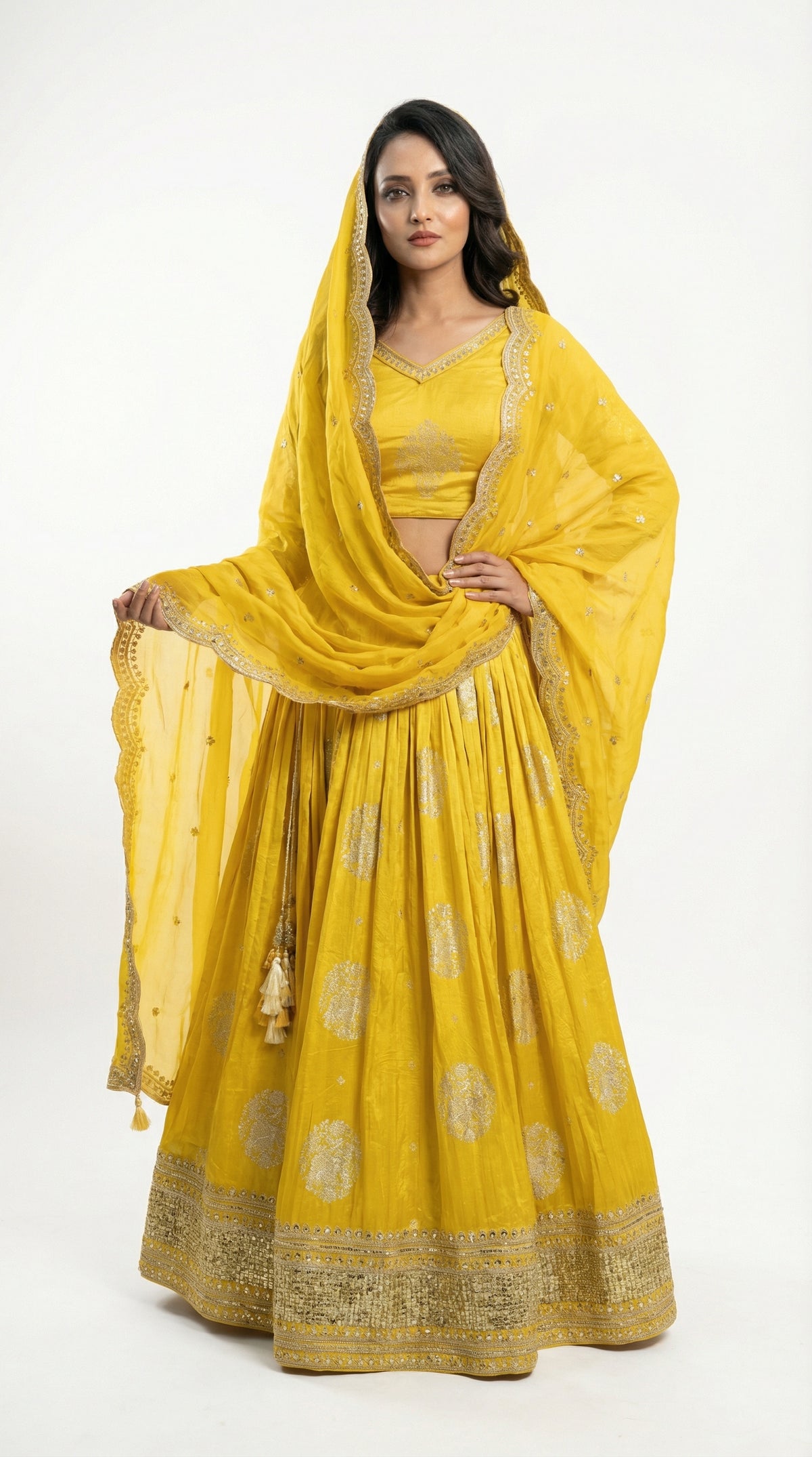 Women wearing banasri yellow lehenga