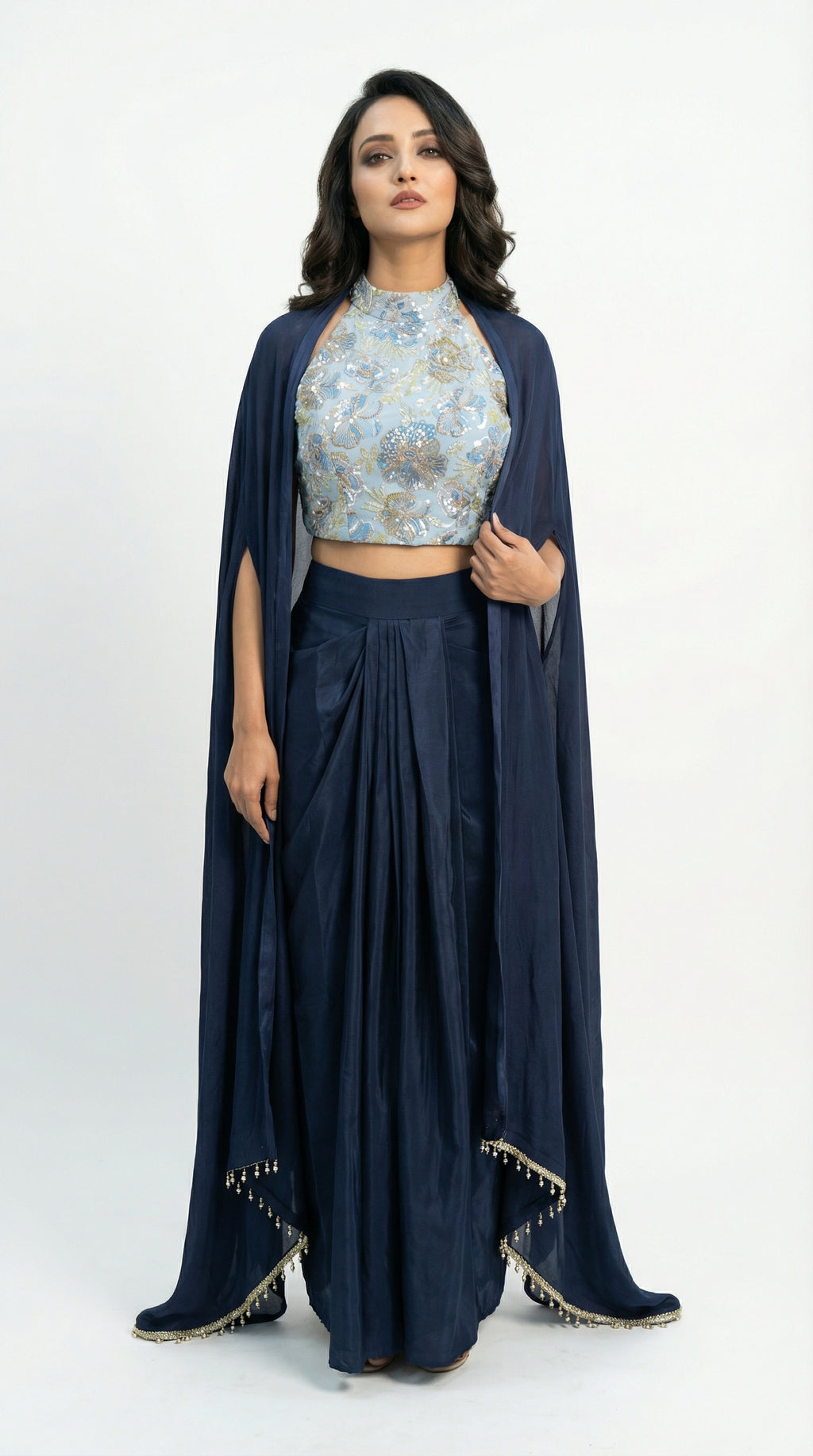 A stylish pose showing the complete midnight blue fusion ensemble, perfect for a modern sangeet or evening cocktail look.