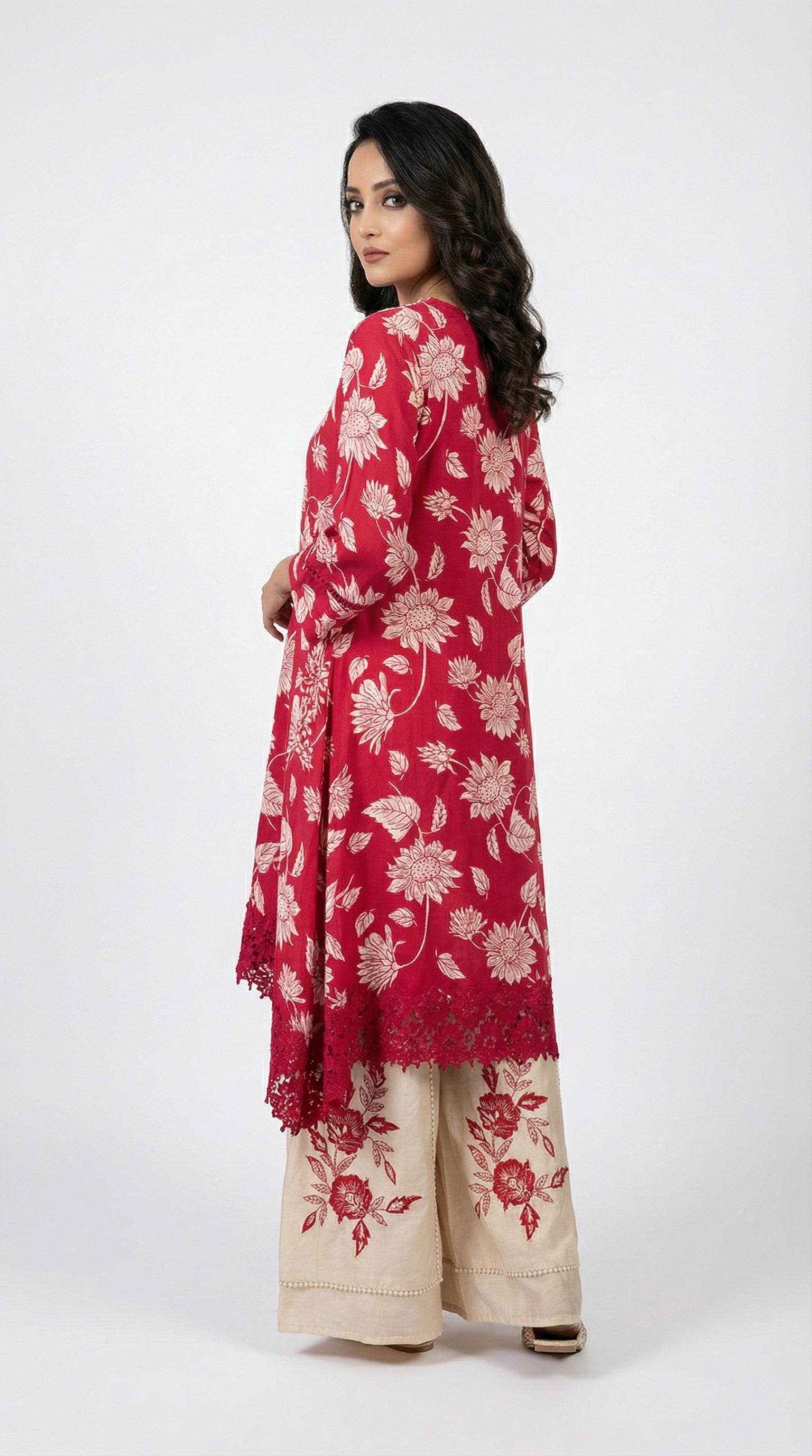 A stylish pose showing the breezy silhouette of the kaftan set, perfect for summer resort wear or casual parties.