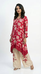A stylish pose showing the breezy silhouette of the kaftan set, perfect for summer resort wear or casual parties.