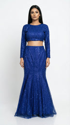 Detail of the fish cut lehenga skirt, highlighting how it hugs the hips and flares at the bottom with heavy sequin work.