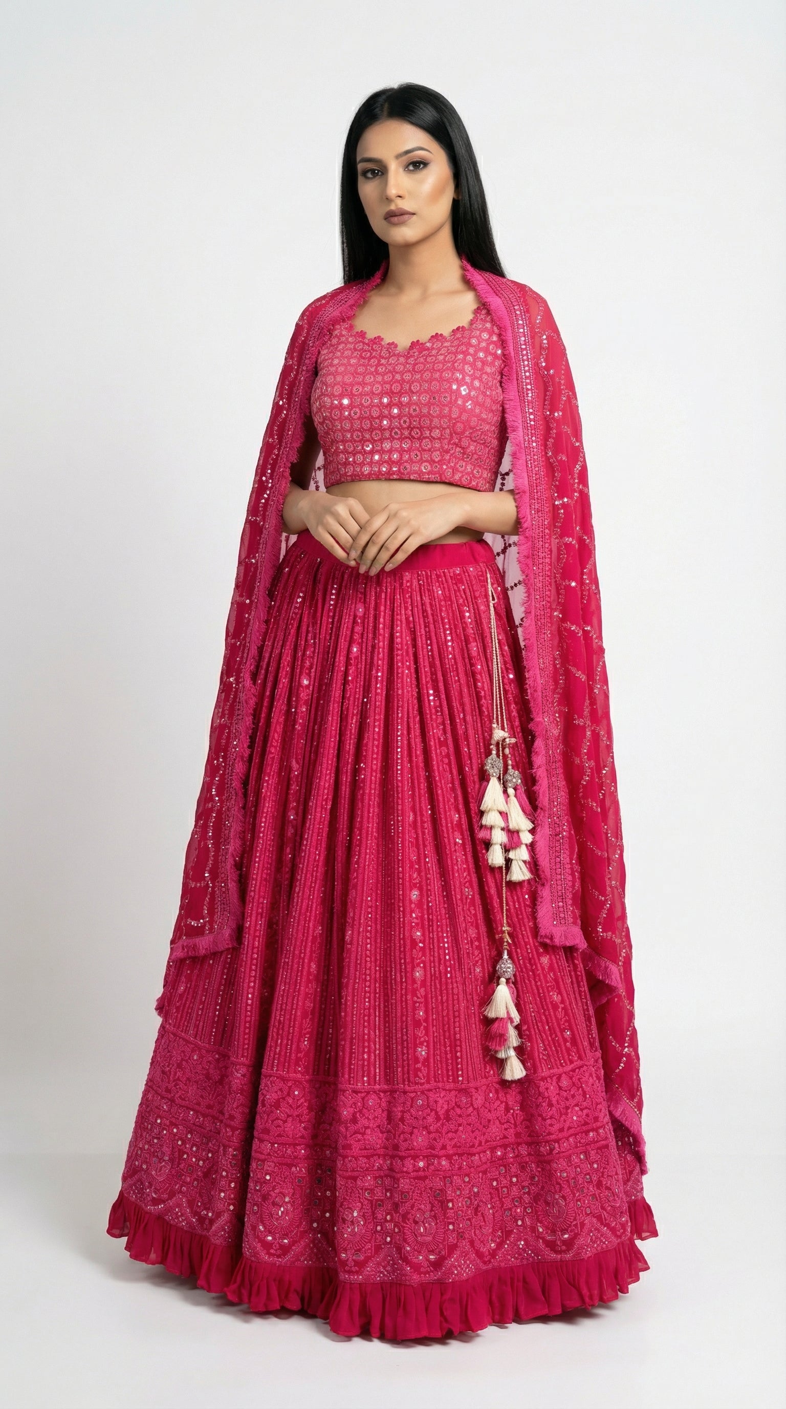 A vibrant pose showing the complete hot pink Lucknowi lehenga look, perfect for a colorful Mehendi or Sangeet ceremony.