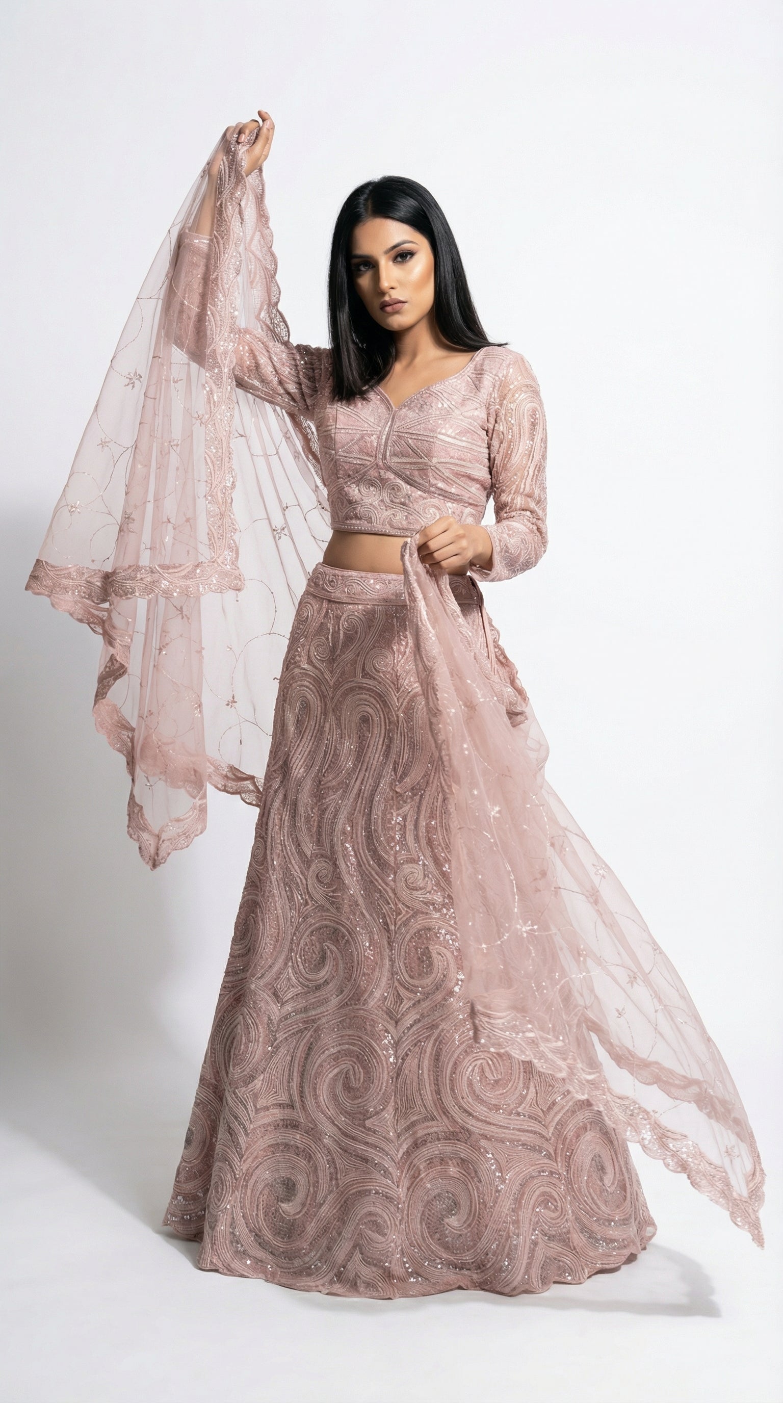 A stylish pose showing the flare and elegance of the monochromatic pink sequin lehenga, perfect for an engagement party.