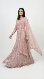 A view of the sheer net dupatta draped over the arm, highlighting the delicate embroidered border and light weight.