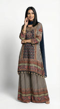 Full body front view of the Rosio House navy blue sharara set featuring a multi-colored ethnic print short kurta and matching striped sharara pants.