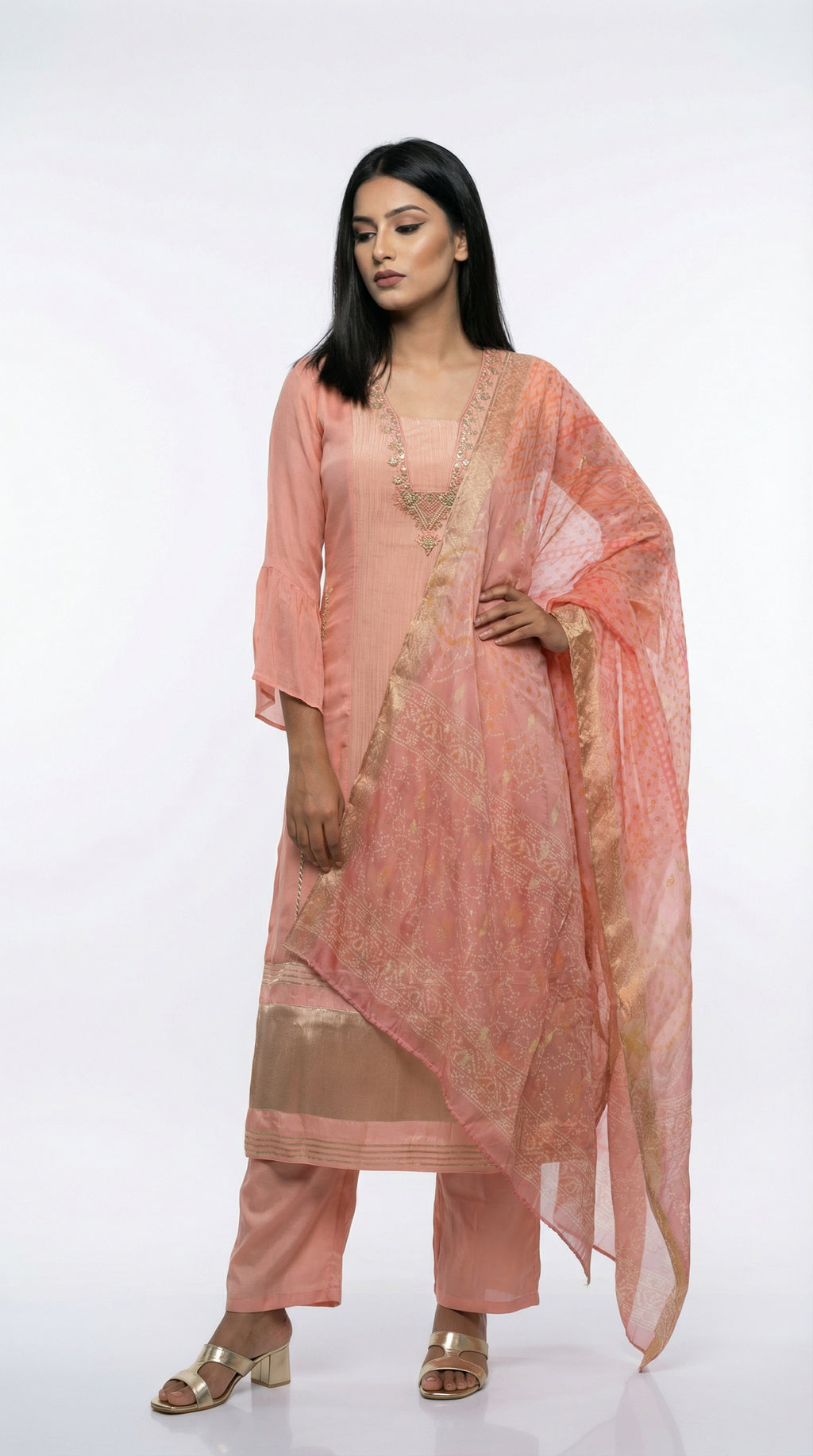 Full body front view of the Rosio House peach chanderi silk suit featuring a paneled kurta with bell sleeves and an organza dupatta.