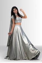 Elegant silver sequin gown with sparkling embellishments for evening events