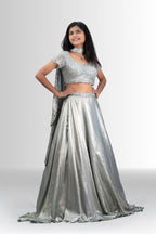 Elegant silver sequin lehenga choli with matching dupatta for weddings and festive occasions