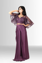 Rosio House's three-piece Indo-Western set  showing the wine satin draped skirt, the heavily embellished sequin bustier, and the matching sheer cape.